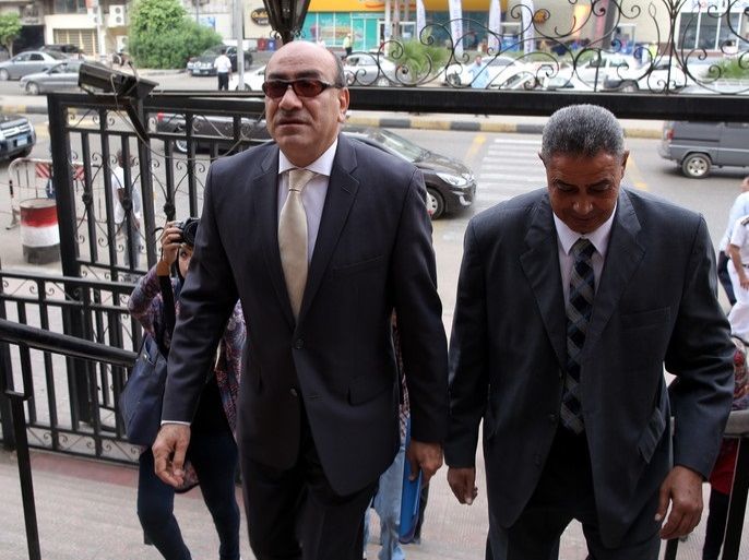 epa06521109 (FILE) - Former head of the Central Auditing Organization (CAO) Hisham Genena (L) arrives to the State Council courthouse, Cairo, Egypt, 25 October 2016 (Reissued 13 February 2018). According to reports on 13 February 2018, Former top auditor in Egypt Hisham Genana was arrested by Egyptian security forces from his home. Genena was the porposed Vice President to former military chief of staff Sami Anan when he announced that he will be running for presidency in the next elections in Egypt, before being arrested by the military police for running for office without permission. EPA-EFE/KHALED ELFIQI