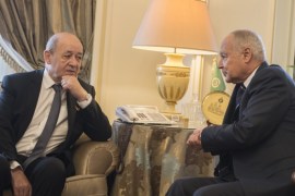 French Foreign Minister Jean-Yves Le Drian (L) meets with Arab League Secretary General Ahmed Aboul Gheit at Arab league headquarters in Cairo