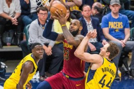 Apr 22, 2018; Indianapolis, IN, USA; Cleveland Cavaliers forward LeBron James (23) shoots the ball while Indiana Pacers guard Darren Collison (2) and forward Bojan Bogdanovic (44) defend in the second half of game four in the first round of the 2018 NBA Playoffs at Bankers Life Fieldhouse. Mandatory Credit: Trevor Ruszkowski-USA TODAY Sports