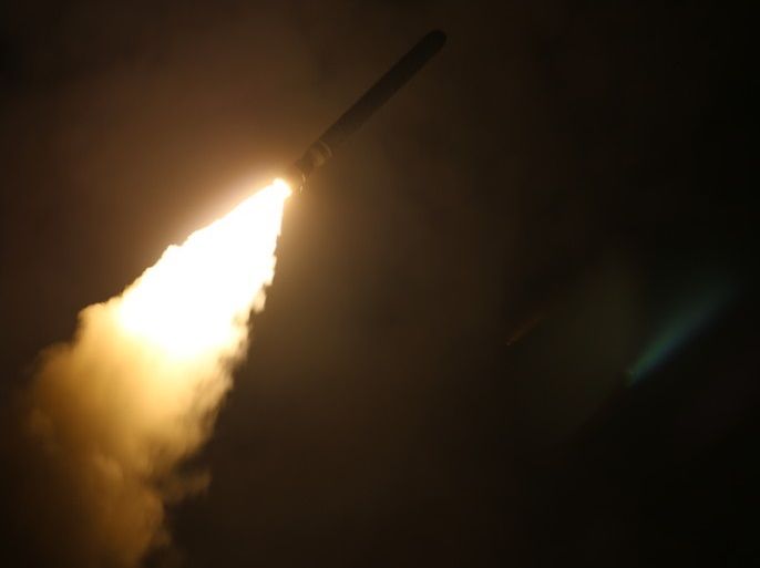 epa06668824 Image dated 14 April 2018 provided by the US Navy showing the guided-missile cruiser USS Monterey (CG 61) fires a Tomahawk land attack missile. Monterey is deployed to the U.S. 5th Fleet area of operations in support of maritime security operations to reassure allies and partners and preserve the freedom of navigation and the free flow of commerce in the region. EPA-EFE/Matthew Daniels HANDOUT EDITORIAL USE ONLY/NO SALES