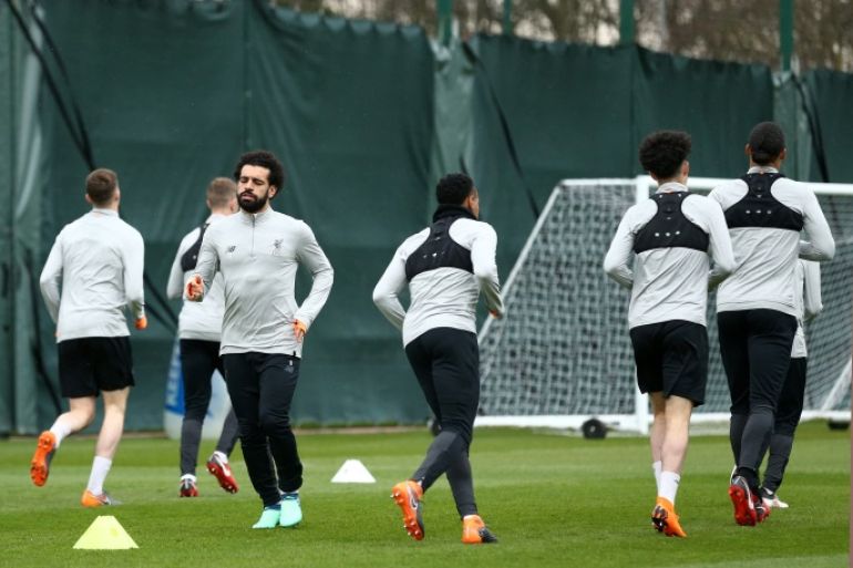 LIVERPOOL, ENGLAND - APRIL 09: Mohamed Salah of Liverpool warms up with team mates during a training session on April 9, 2018 in Liverpool, England. (Photo by Jan Kruger/Getty Images)