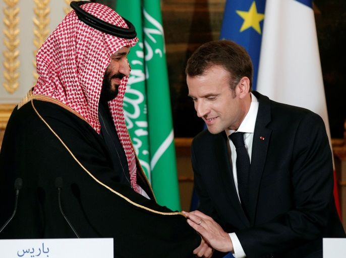 French President Emmanuel Macron and Saudi Arabia's Crown Prince Mohammed bin Salman attend a press conference at the Elysee Palace in Paris, France, April 10, 2018. Yoan Valat/Pool via Reuters