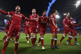 MANCHESTER, ENGLAND - APRIL 10: The Liverpool players celebrates after their sides first goal during the UEFA Champions League Quarter Final Second Leg match between Manchester City and Liverpool at Etihad Stadium on April 10, 2018 in Manchester, England. (Photo by Laurence Griffiths/Getty Images,)