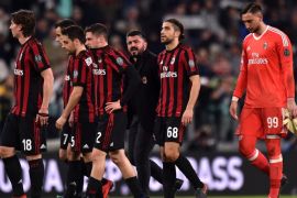 TURIN, ITALY - MARCH 31: Players of Milan show their dejection after losing the serie A match between Juventus and AC Milan at Allianz Stadium on March 31, 2018 in Turin, Italy. (Photo by Tullio M. Puglia/Getty Images )