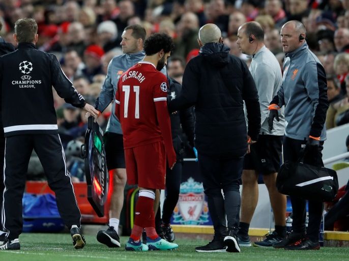 Soccer Football - Champions League Quarter Final First Leg - Liverpool vs Manchester City - Anfield, Liverpool, Britain - April 4, 2018 Liverpool's Mohamed Salah leaves the pitch as he is substituted after sustaining an injury Action Images via Reuters/Carl Recine