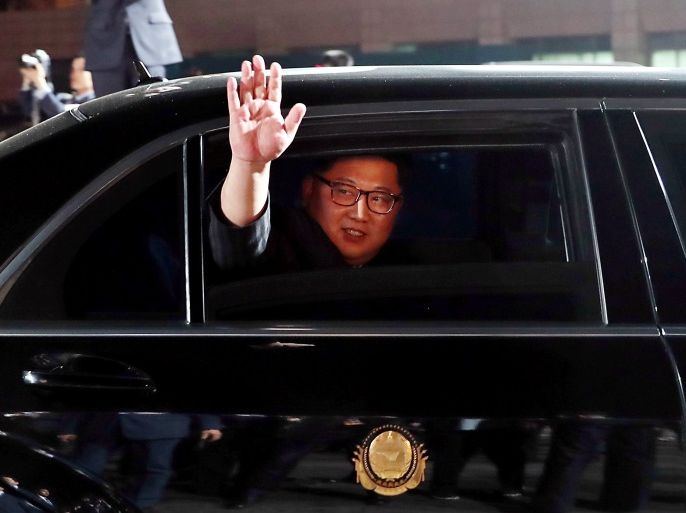 North Korean leader Kim Jong Un (inside a vehicle) bids farewell to South Korean President Moon Jae-in as he leaves after a farewell ceremony at the truce village of Panmunjom inside the demilitarized zone separating the two Koreas, South Korea, April 27, 2018. Korea Summit Press Pool/Pool via Reuters TPX IMAGES OF THE DAY
