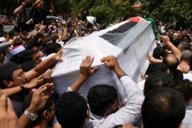 People carry the coffin with the body of Palestinian man Fadi al-Batsh, who was shot to death, to a mosque for a special prayer in Kuala Lumpur, Malaysia April 25, 2018. REUTERS/Stringer