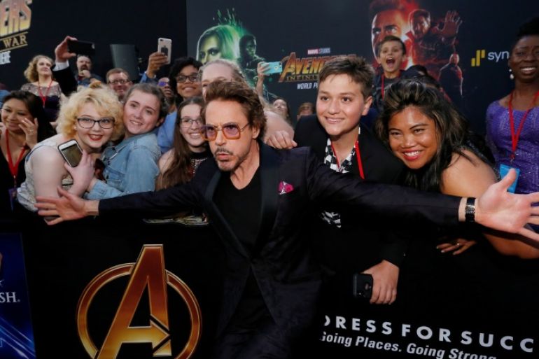 Premiere of “Avengers: Infinity Wars” - Arrivals - Los Angeles, California, U.S., 23/04/2018 - Actor Robert Downey Jr. poses with fans. REUTERS/Mario Anzuoni TPX IMAGES OF THE DAY