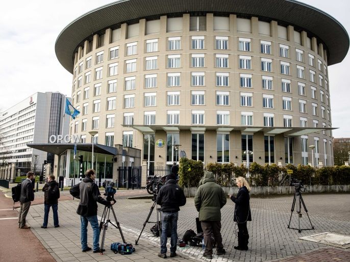 Journalists wait outside the headquarters of the Organisation for the Prohibition of Chemical Weapons (OPCW) in The Hague, The Netherlands, 04 April 2018 (re-issued 12 April 2018). British media on 12 April 2018 report the OPCW has confirmed Britain's claims of the kind of nerve poison that was used in Russian ex-spy Sergei Skripal and his daughter Yulia Skripal poisoning case. OPCW did not specify the nerve poison as being Novichok, but did agree with British claims on the identity. EPA-EFE/BART MAAT