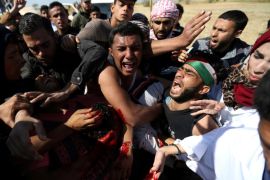 ATTENTION EDITORS - VISUAL COVERAGE OF SCENES OF INJURY OR DEATH People react as they evacuate deaf Palestinian Tahreer Abu Sabala, 17, who was shot and wounded in the head during clashes with Israeli troops, at Israel-Gaza border, in the southern Gaza Strip April 1, 2018. REUTERS/Ibraheem Abu Mustafa TEMPLATE OUT TPX IMAGES OF THE DAY
