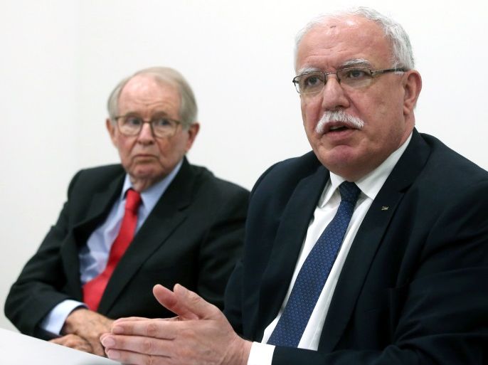 Palestinian Foreign Minister Riyad al-Maliki holds a news conference next to legal adviser John Dugard at the International Criminal Court in The Hague, Netherlands, May 22, 2018. REUTERS/Francois Walschaerts