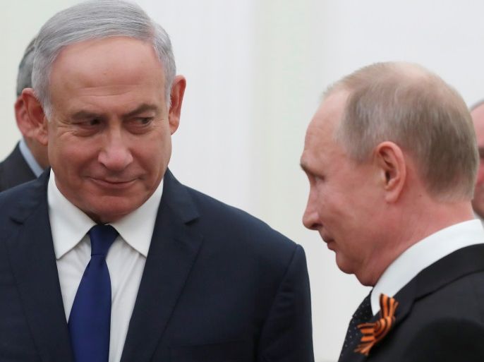 Russian President Vladimir Putin and Israeli Prime Minister Benjamin Netanyahu attend a meeting at the Kremlin in Moscow, Russia May 9, 2018. Sergei Ilnitsky/Pool via REUTERS