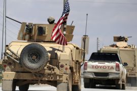 The U.S. flag flutters on a military vehicle in Manbej countryside, Syria May 12, 2018. REUTERS/Aboud Hamam