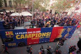 Soccer Football - FC Barcelona Parade - Barcelona, Spain - April 30, 2018 FC Barcelona players celebrate during the parade REUTERS/Albert Gea