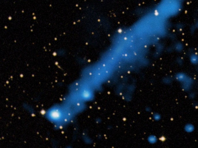 Astronomers using NASA's Chandra X-ray Observatory found that this pulsar, known as PSR J0357+3205 (or PSR J0357 for short), apparently has a long, bright X-ray tail streaming away from it, in this NASA handout image released on August 18, 2011. This composite image shows Chandra data in blue and Digitized Sky Survey data in yellow. The two bright sources lying near the lower left end of the tail are both thought to be unrelated background objects located outside our galaxy. PSR J0357 was originally discovered by the Fermi Gamma Ray Space Telescope in 2009. Astronomers calculate that the pulsar lies about 1,600 light years from Earth and is about half a million years old, which makes it roughly middle-aged for this type of object. Image Credit: REUTERS/X-ray: NASA/CXC/IUSS/A.De Luca et al; Optical: DSS/Handout (UNITED STATES - Tags: SCI TECH) FOR EDITORIAL USE ONLY. NOT FOR SALE FOR MARKETING OR ADVERTISING CAMPAIGNS. THIS IMAGE HAS BEEN SUPPLIED BY A THIRD PARTY. IT IS DISTRIBUTED, EXACTLY AS RECEIVED BY REUTERS, AS A SERVICE TO CLIENTS