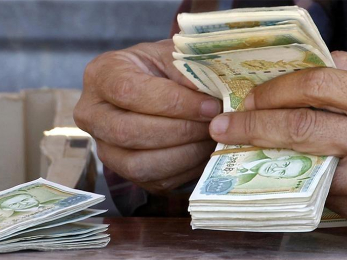 الدولار بألف ليرة.. انهيار غير مسبوق للعملة السورية | سوريا | الجزيرة نت
