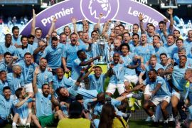 Soccer Football - Premier League - Manchester City vs Huddersfield Town - Etihad Stadium, Manchester, Britain - May 6, 2018 Manchester City celebrate with the trophy after winning the Premier League title Action Images via Reuters/Carl Recine EDITORIAL USE ONLY. No use with unauthorized audio, video, data, fixture lists, club/league logos or
