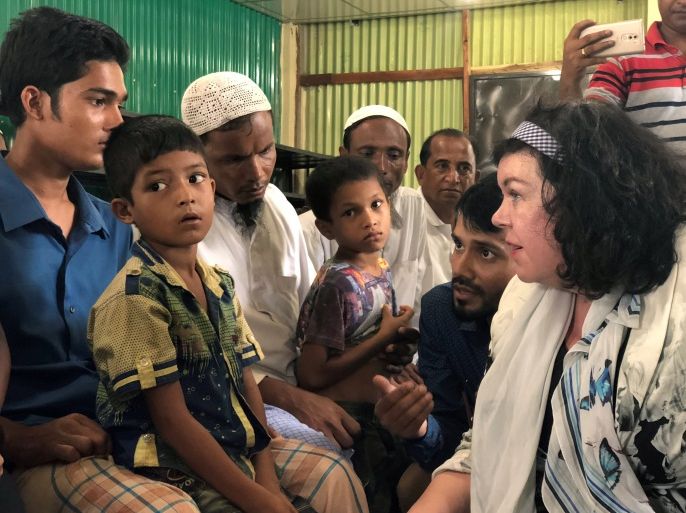 British Ambassador to the United Nations Karen Pierce speaks to Rohingya refugees at a refugee camp in Cox's Bazar, Bangladesh, during a visit by the U.N. Security Council to Bangladesh and Myanmar, April 29, 2018. Picture taken on April 29, 2018. REUTERS/Kevin Fogarty