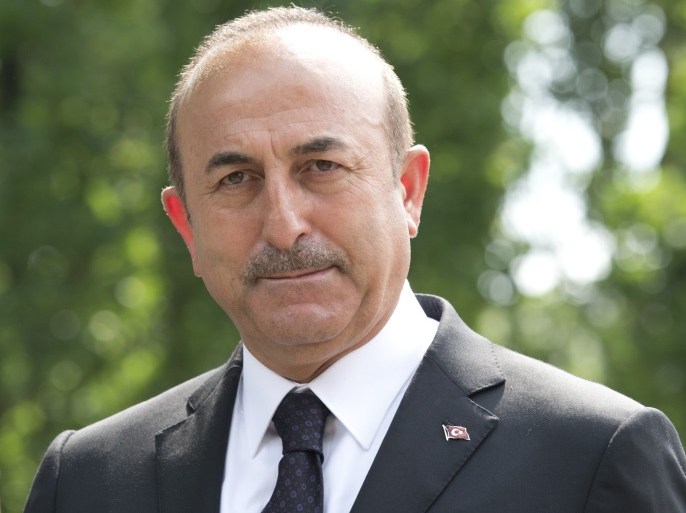 SOLINGEN, GERMANY - MAY 29: Mevlut Cavusoglu, Foreign Minister of Turkey, visits the memorial site of the arson attack on the house of the Turkish Genc family 25 years ago on May 29, 2018 in Solingen, Germany. On May 29, 1993 neo-Nazis set the house of a Turkish family on fire, resulting in the deaths of two adults and three children. Police arrested four suspects, all of them locals who were later sentenced to prison for the attack. The crime came in the wake of a string of anti-foreigner riots and incidents in 1991 and 1992, mostly in eastern Germany, following German reunification. (Photo by Michael Gottschalk/Getty Images)