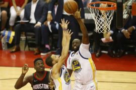 May 16, 2018; Houston, TX, USA; Golden State Warriors forward Draymond Green (23) and guard Stephen Curry (30) play for the rebound in front of Houston Rockets center Clint Capela (15) during the second half in game two of the Western conference finals of the 2018 NBA Playoffs at Toyota Center. Mandatory Credit: Troy Taormina-USA TODAY Sports