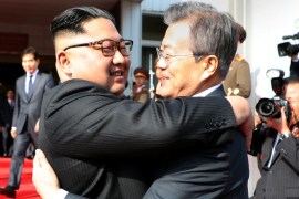 South Korean President Moon Jae-in bids fairwell to North Korean leader Kim Jong Un as he leaves after their summit at the truce village of Panmunjom, North Korea, in this handout picture provided by the Presidential Blue House on May 26, 2018. The Presidential Blue House /Handout via REUTERS ATTENTION EDITORS - THIS IMAGE WAS PROVIDED BY A THIRD PARTY