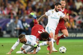 KIEV, UKRAINE - MAY 26: Mohamed Salah of Liverpool falls and lands on his shoulder after a collision with Sergio Ramos of Real Madrid, leading to him going off injured during the UEFA Champions League Final between Real Madrid and Liverpool at NSC Olimpiyskiy Stadium on May 26, 2018 in Kiev, Ukraine. (Photo by Michael Regan/Getty Images)