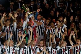 Soccer Football - Coppa Italia Final - Juventus vs AC Milan - Stadio Olimpico, Rome, Italy - May 9, 2018 Juventus celebrate with the trophy after winning the Coppa Italia REUTERS/Stefano Rellandini