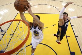 May 8, 2018; Oakland, CA, USA; Golden State Warriors guard Klay Thompson (11) dunks the basketball against New Orleans Pelicans forward Nikola Mirotic (3) during the first half in game five of the second round of the 2018 NBA Playoffs at Oracle Arena. The Warriors defeated the Pelicans 113-104. Mandatory Credit: Ezra Shaw/Pool Photo via USA TODAY Sports TPX IMAGES OF THE DAY
