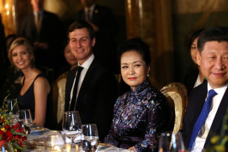 China's first lady Peng Liyuan looks at Chinese President Xi Jinping (R) as she sits next to Trump Senior Advisor Jared Kushner and Ivanka Trump (L), during a dinner at the start of a summit between U.S. President Donald Trump and Chinese President Xi at Trump's Mar-a-Lago estate in West Palm Beach, Florida, U.S. April 6, 2017. REUTERS/Carlos Barria