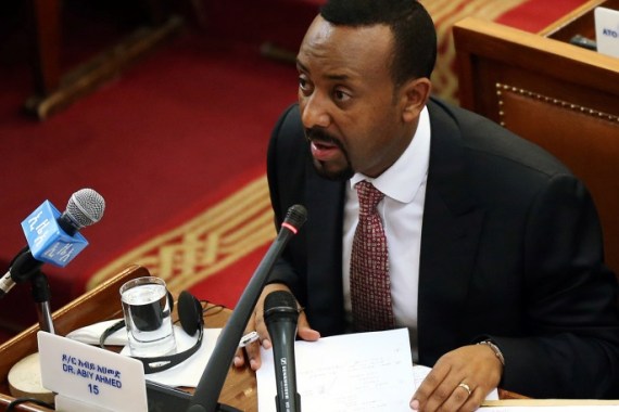 Ethiopia's newly elected Prime Minister Abiy Ahmed addresses the members of parliament inside the House of Peoples' Representatives in Addis Ababa, Ethiopia April 19, 2018. REUTERS/Tiksa Negeri