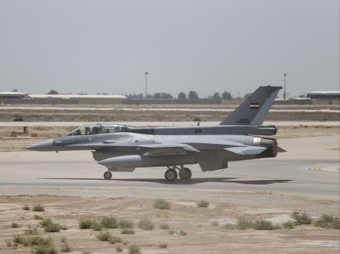 U.S. F-16 fighter jet is seen during an official ceremony to receive four of these aircrafts from the U.S. at the tarmac a military base in Balad, Iraq, July 20, 2015. REUTERS/Thaier Al-Sudani
