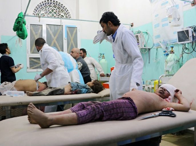 ATTENTION EDITORS - VISUAL COVERAGE OF SCENES OF INJURY OR DEATH Doctors treat children injured by air strikes in Saada, Yemen March 7, 2018. REUTERS/Naif Rahma TEMPLATE OUT