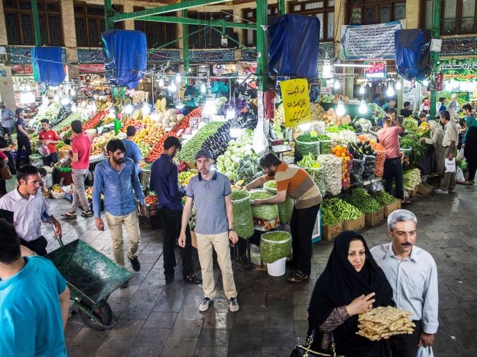 People buy vegetables and fruits at the Tajrish Bazaar in northern part of Tehran, Iran, August 2, 2017. Nazanin Tabatabaee Yazdi/TIMA via REUTERS ATTENTION EDITORS - THIS IMAGE WAS PROVIDED BY A THIRD PARTY.