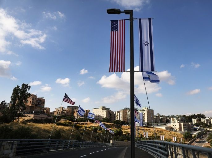 JERUSALEM, ISRAEL - MAY 09: American and Israeli flags fly at the entrance to the new American embassy in Jerusalem which is scheduled to open next week on May 9, 2018 in Jerusalem, Israel. In a controversial move, the United States is to move its embassy in Israel from Tel Aviv to Jerusalem on May 14. Jerusalem's Israeli-annexed eastern sector has been long sought for a future Palestinian capital and the move is viewed by Palestinians as a U.S. breach of long-standin