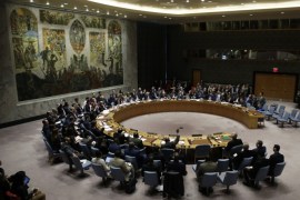 Members of the United Nations Security Council vote on a resolution