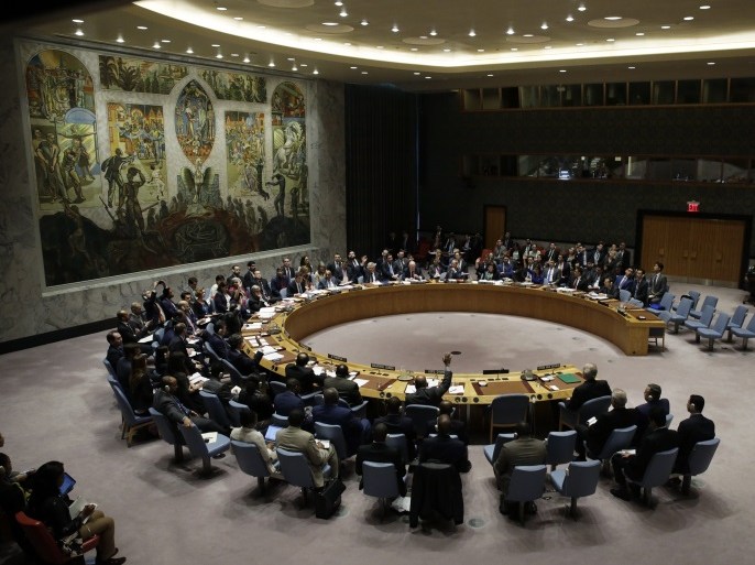 Members of the United Nations Security Council vote on a resolution