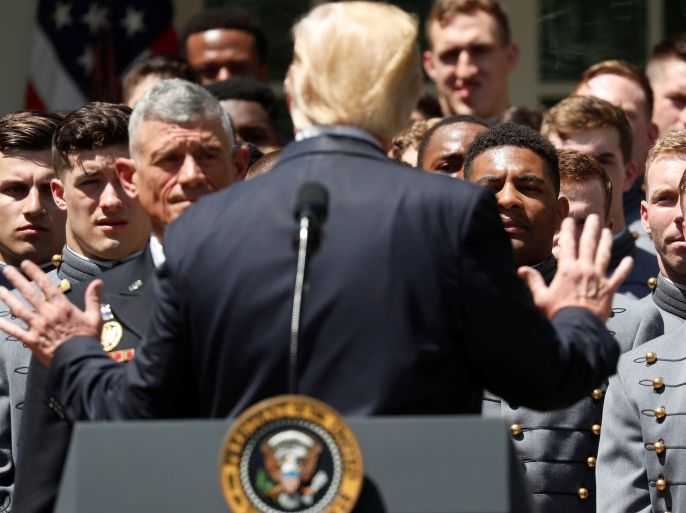 U.S. President Donald Trump addresses the U.S. Military Academy football team as he presents them with the Commander-in-Chief's Trophy in the Rose Garden at the White House in Washington, U.S., May 1, 2018. REUTERS/Leah Millis