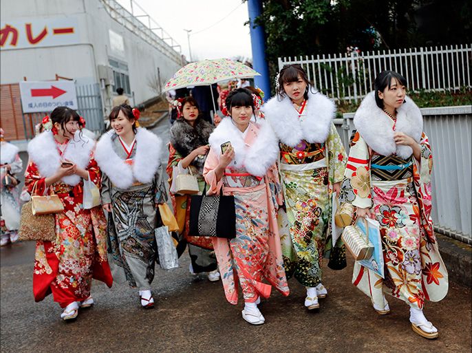 Young Japanese women dressed in colorful kimonos gather for a ceremony marking the 'Coming of Age Day' at Toshimaen Amusement Park in Tokyo, Japan, 08 January 2018.