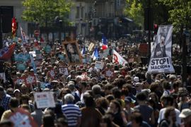 epa06713366 Thousands of protesters gather during a demonstration titled 'La fete a Macron' (Macron's party) against the policies of French President Emmanuel Macron organised by Far-left La France Insoumise (France unbowed) political party, in Paris, France, 05 May 2018. France is undergoing social unrest, with railway workers conducting strike actions over three months to protest against the government's initiative to reform their labor perks. EPA-EFE/YOAN VALAT