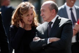 epa06681958 French Interior Minister Gerard Collomb and Justice Minister Nicole Belloubet attend a ceremony to pay tribute to Xavier Jugele one year after the French police officer was killed during a shooting incident, on the Champs Elysees avenue in Paris, France, 20 April 2018. EPA-EFE/BENOIT TESSIER / POOL / MAXPPP OUT