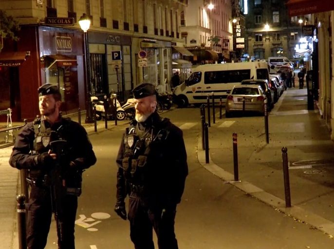 Police guard the scene of a knife attack in Paris, France May 12, 2018 in this still image obtained from a video. REUTERS/Reuters TV