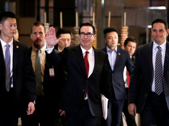 U.S. Treasury Secretary Steven Mnuchin, a member of the U.S. trade delegation to China, waves to the media as he returns to a hotel in Beijing, China May 3, 2018. REUTERS/Jason Lee