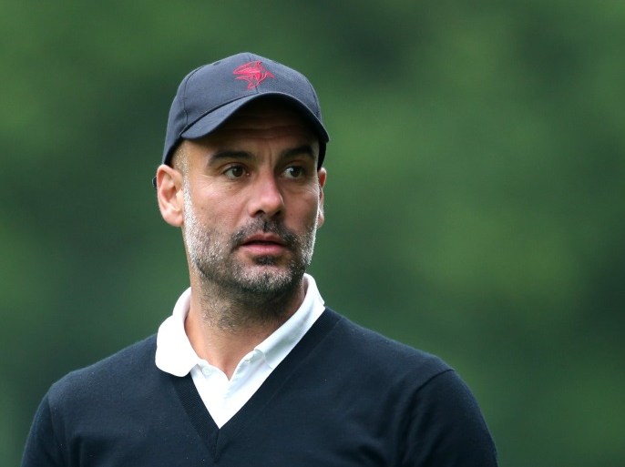 VIRGINIA WATER, ENGLAND - MAY 23: Pep Guardiola looks on during the Pro Am for the BMW PGA Championship at Wentworth on May 23, 2018 in Virginia Water, England. (Photo by Alex Pantling/Getty Images)