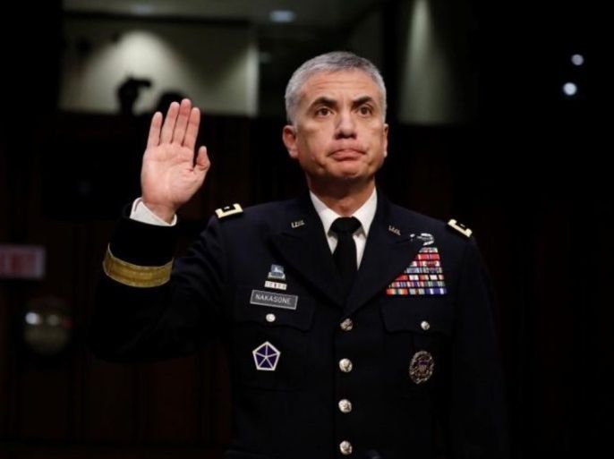 FILE PHOTO: Lieutenant General Paul Nakasone, nominee to lead the National Security Agency and US Cyber Command, is sworn in before the Senate Intelligence Committee on Capitol Hill in Washington, U.S., March 15, 2018. REUTERS/Aaron P. Bernstein