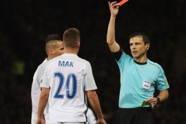 GLASGOW, SCOTLAND - OCTOBER 05: Robert Mak of Slovakia (20) is shown a red card by referee Milorad Mazic and is sent off during the FIFA 2018 World Cup Group F Qualifier between Scotland and Slovakia at Hampden Park on October 5, 2017 in Glasgow, Scotland. (Photo by Ian MacNicol/Getty Images)