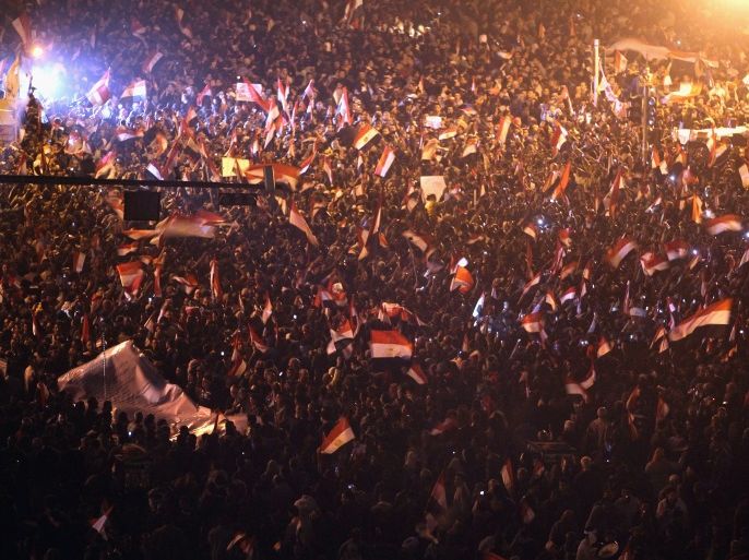 CAIRO, EGYPT - FEBRUARY 11: Anti-government demonstrators celebrate in Tahrir Square upon hearing the news of the resignation of Egyptian President Hosni Mubarak on February 11, 2011 in Cairo, Egypt. After 18 days of widespread protests, Egyptian President Hosni Mubarak, who has now left Cairo for his home in the Egyptian resort town of Sharm el-Sheik, announced that he would step down. (Photo by John Moore/Getty Images)