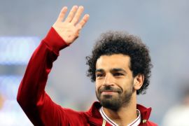Soccer Football - Champions League Final - Real Madrid v Liverpool - NSC Olympic Stadium, Kiev, Ukraine - May 26, 2018 Liverpool's Mohamed Salah waves to fans before the match REUTERS/Andrew Boyers