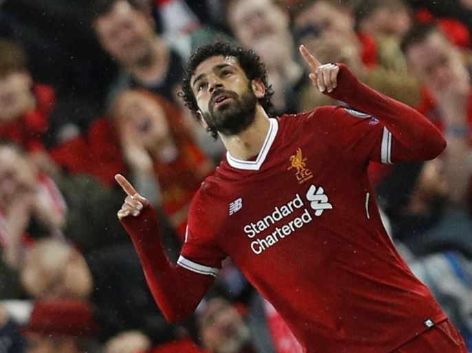 Soccer Football - Champions League Semi Final First Leg - Liverpool vs AS Roma - Anfield, Liverpool, Britain - April 24, 2018 Liverpool's Mohamed Salah celebrates scoring their first goal REUTERS/Phil Noble