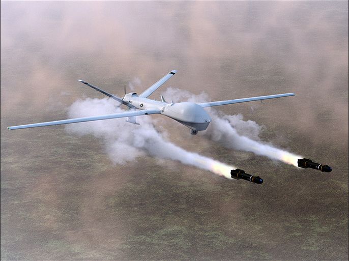 A military predator drone firing its two missiles.
