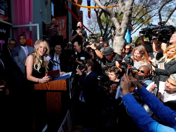Stormy Daniels, the porn star currently in legal battles with U.S. President Donald Trump, speaks during a ceremony in her honor in West Hollywood, California, U.S., May 23, 2018. REUTERS/Mike Blake TPX IMAGES OF THE DAY